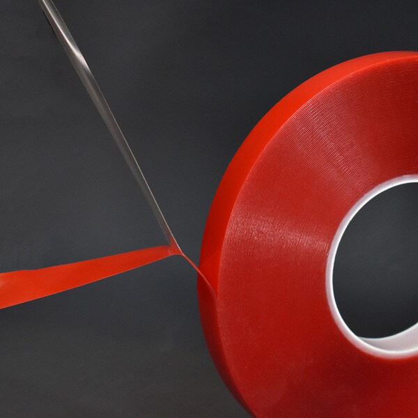 Clear high bond being removed from red liner