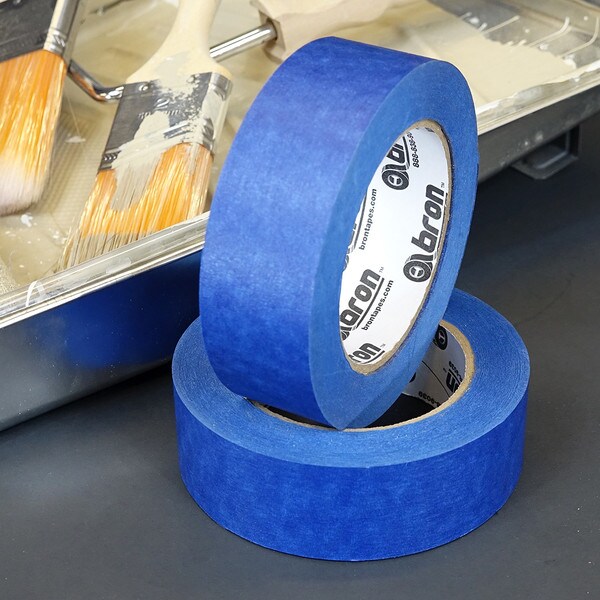 BT-190 blue painters tape with paint brushes and painting materials