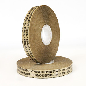 Two rolls of adhesive transfer tape
