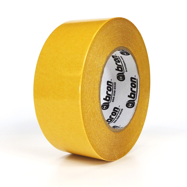 Roll of Golden Bond double sided tape on white background