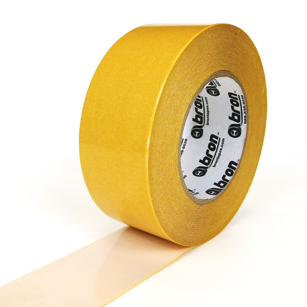 Roll of Golden Bond double sided tape partially unwound to show carrier and adhesive
