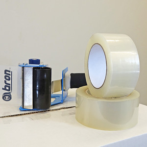 Rolls of BT-420A carton sealing tape with blue tape dispenser