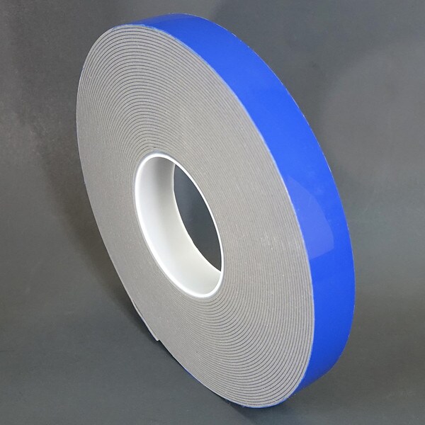 Roll of 2 inch 60 mil grey high bond with a blue liner